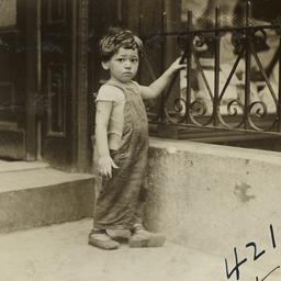 Boy Holding Railing