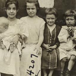 Children Sitting near Door