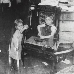 Two Children in Room with M...