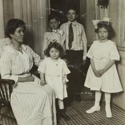 Seated Woman with Four Stan...