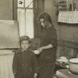 Two Children in Kitchen wit...