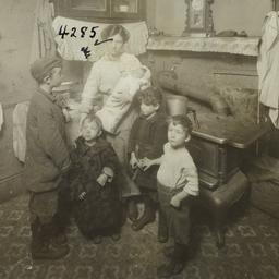 Mother with Baby and Four Boys