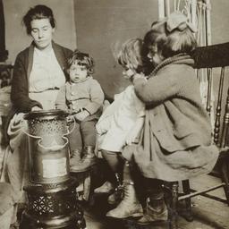 Woman with Four Children Ar...