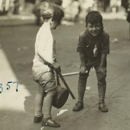 Boys with Pot and Sticks