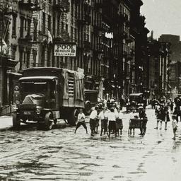 Children in Street near Poo...