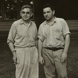Two Men Outside Building