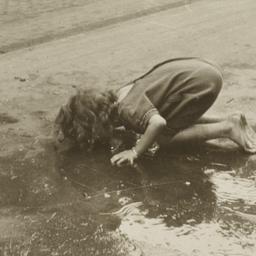 Child Drinking From Leak in...