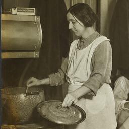 Woman Cooking near Man and ...