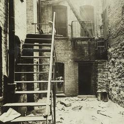 Airshaft with Boy on Stairs