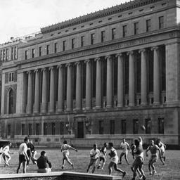Ball Playing in Front of Bu...