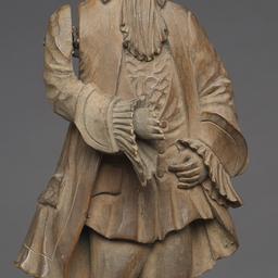 Wood Ledge Puppet Of An Eig...