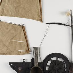 Boat With Wheel And Two Sai...