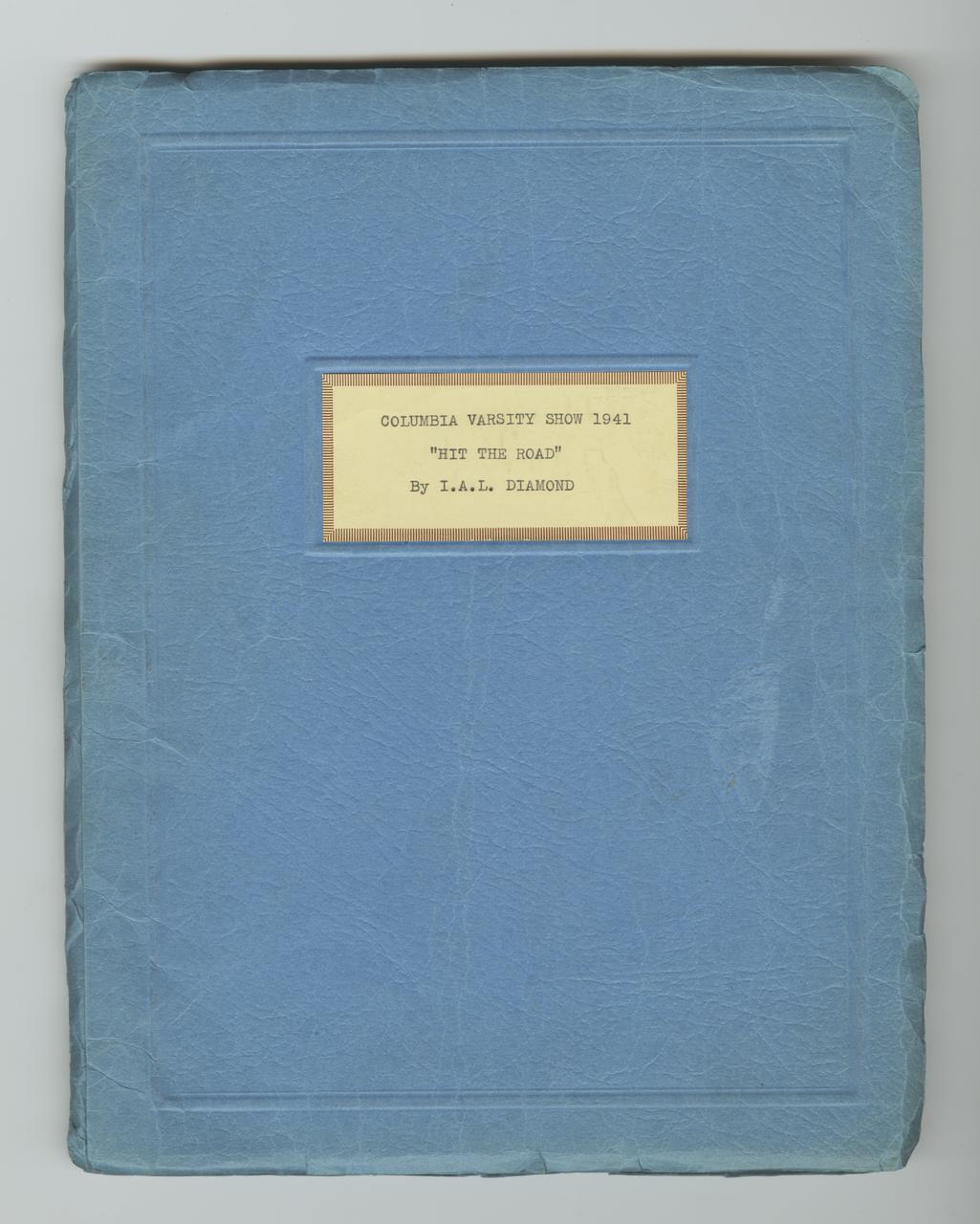 Blue paper cover of a script with typewritten label that says “Columbia Varsity Show 1941, Hit The Road, By I.A.L. Diamond”.
